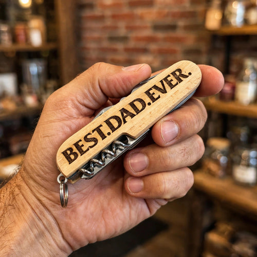 Best Dad Ever Engraved Pocket Knife held in hand for scale
