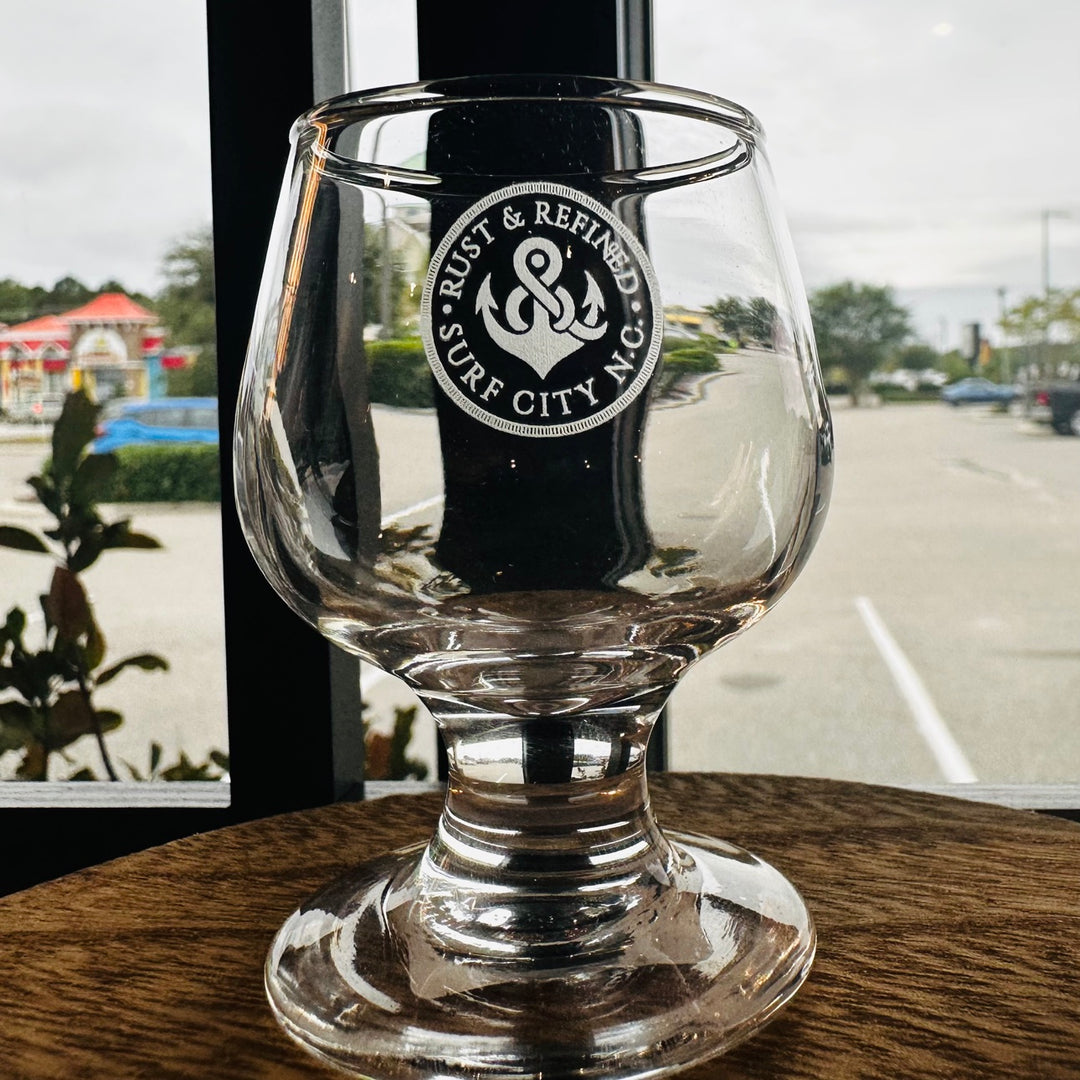 Mini cognac shot glass with Rust and Refined anchor logo
