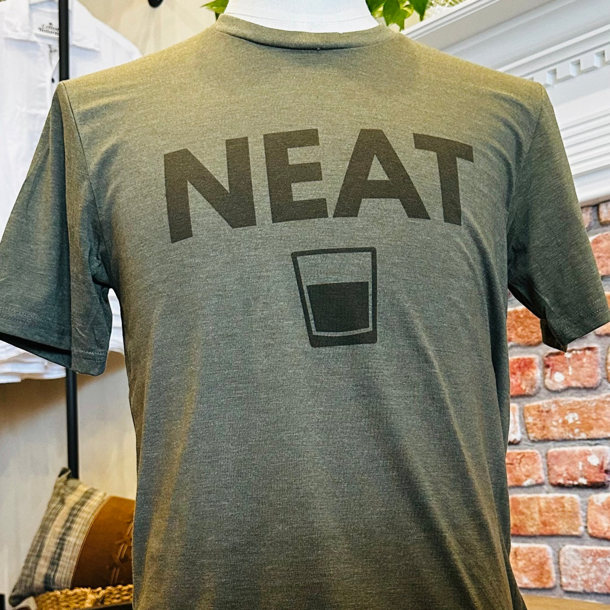 Neat Tee in olive on mannequin