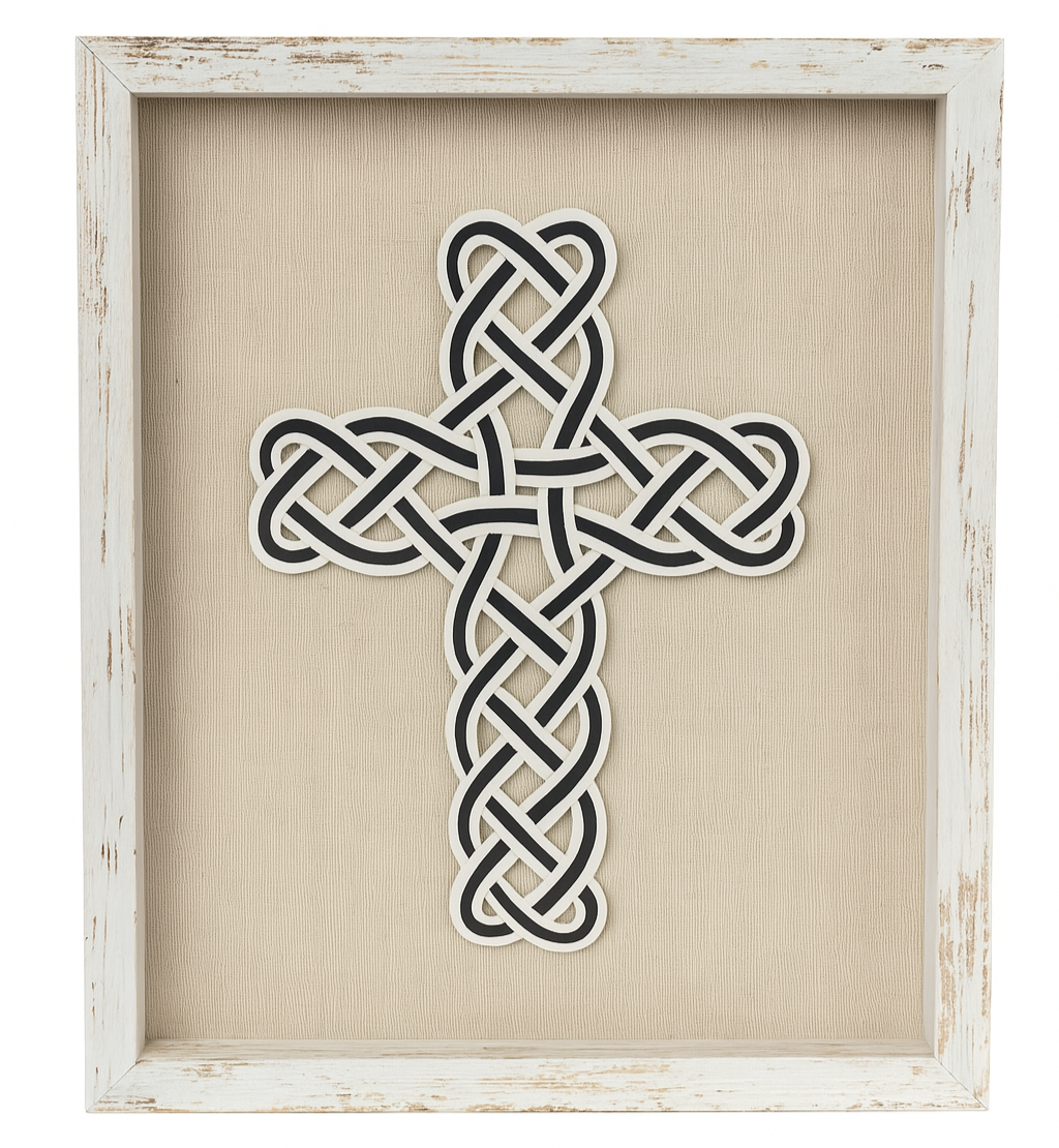 Decorative cross with Celtic knot design in a white frame on a beige background
