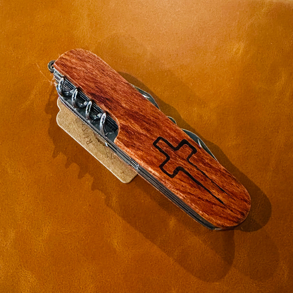 Cross Engraved Pocket Knife dark wood handle