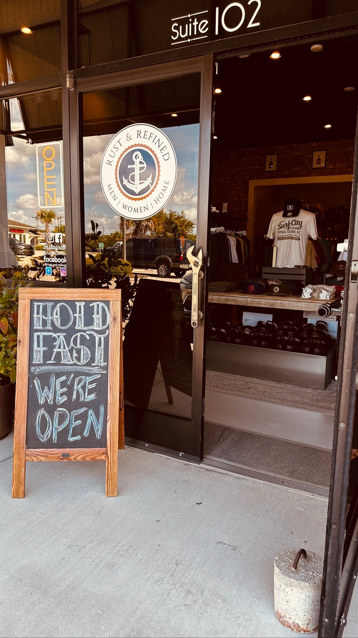 Rust & Refined storefront, open door with Hold Fast sign, Surf City NC
