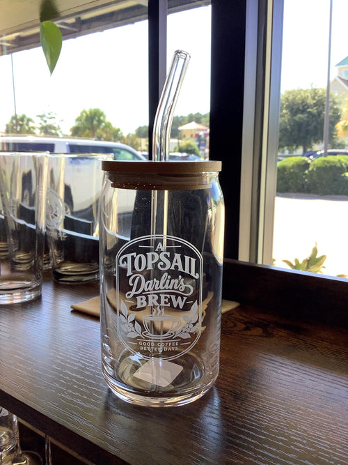 Topsail Darlin's Brew can-shaped glass with bamboo lid and glass straw, etched coffee badge design